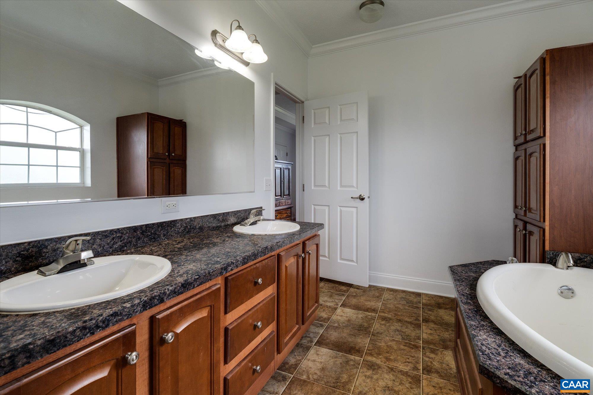 3225 Lynn Hollow Road North Tazewell, VA 24630 - Photo 41 of 62 a bathroom with a granite countertop sink and a mirror