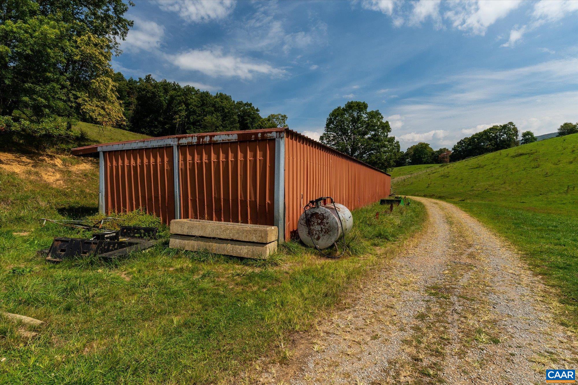 3225 Lynn Hollow Road North Tazewell, VA 24630 - Photo 51 of 62 a view of a backyard with grass and entertaining space