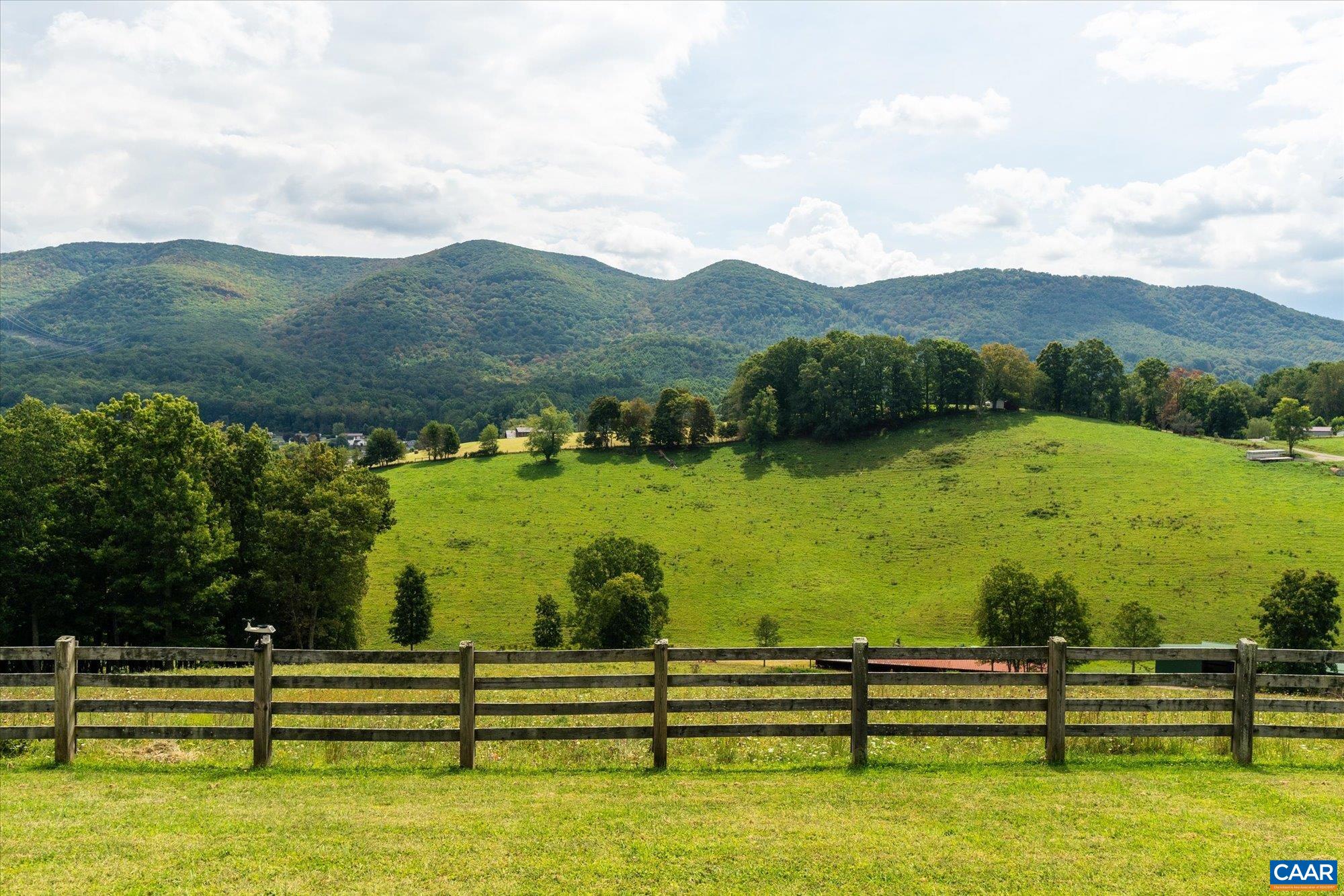 3225 Lynn Hollow Road North Tazewell, VA 24630 - Photo 53 of 62 a view of a lake with houses in the back