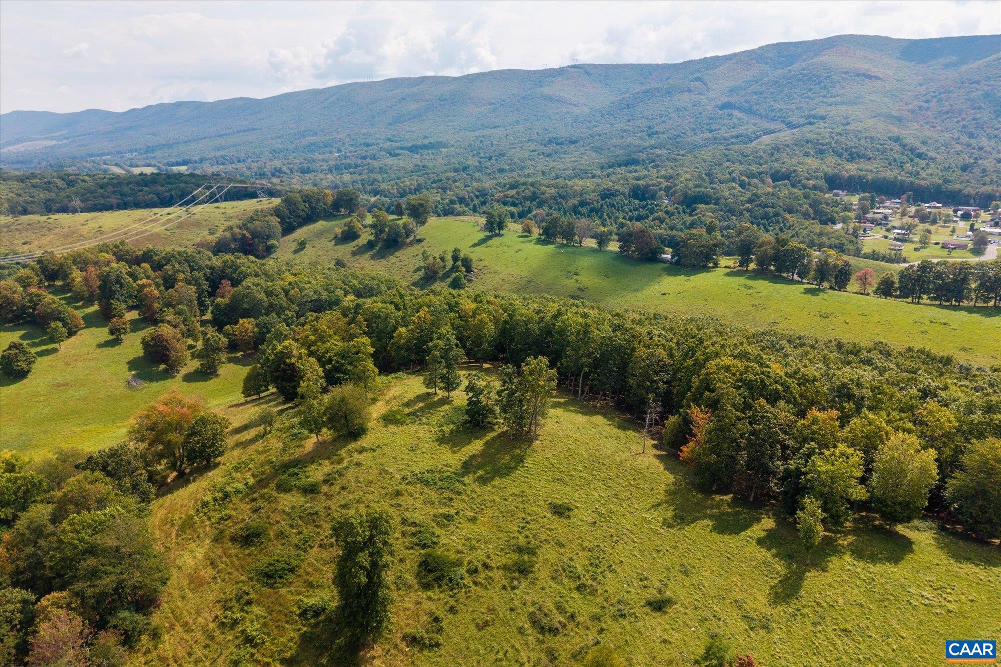 3225 Lynn Hollow Road North Tazewell, VA 24630 - Photo 6 of 62 a view of a lush green hillside and houses
