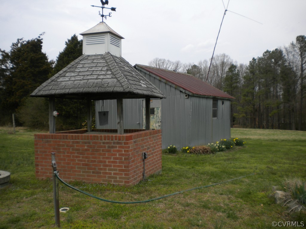14314 Blunts Bridge Road Ashland, VA 23005 - Photo 5 of 16 Pump house with cupola and weather vane and the to
