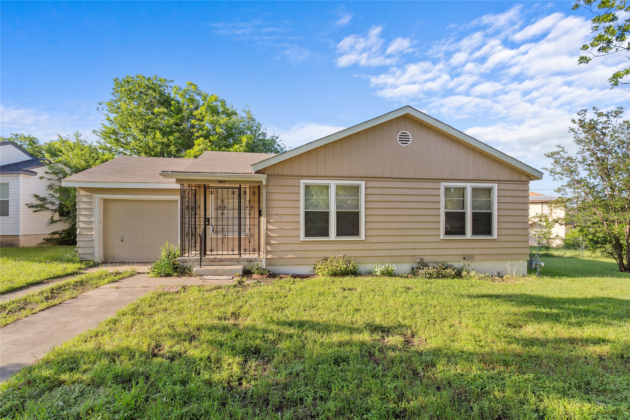 801 Evetts Road Killeen, TX 76541 - Photo 1 of 16 A charming single-story residence, featuring a welcoming covered porch and an attached garage.