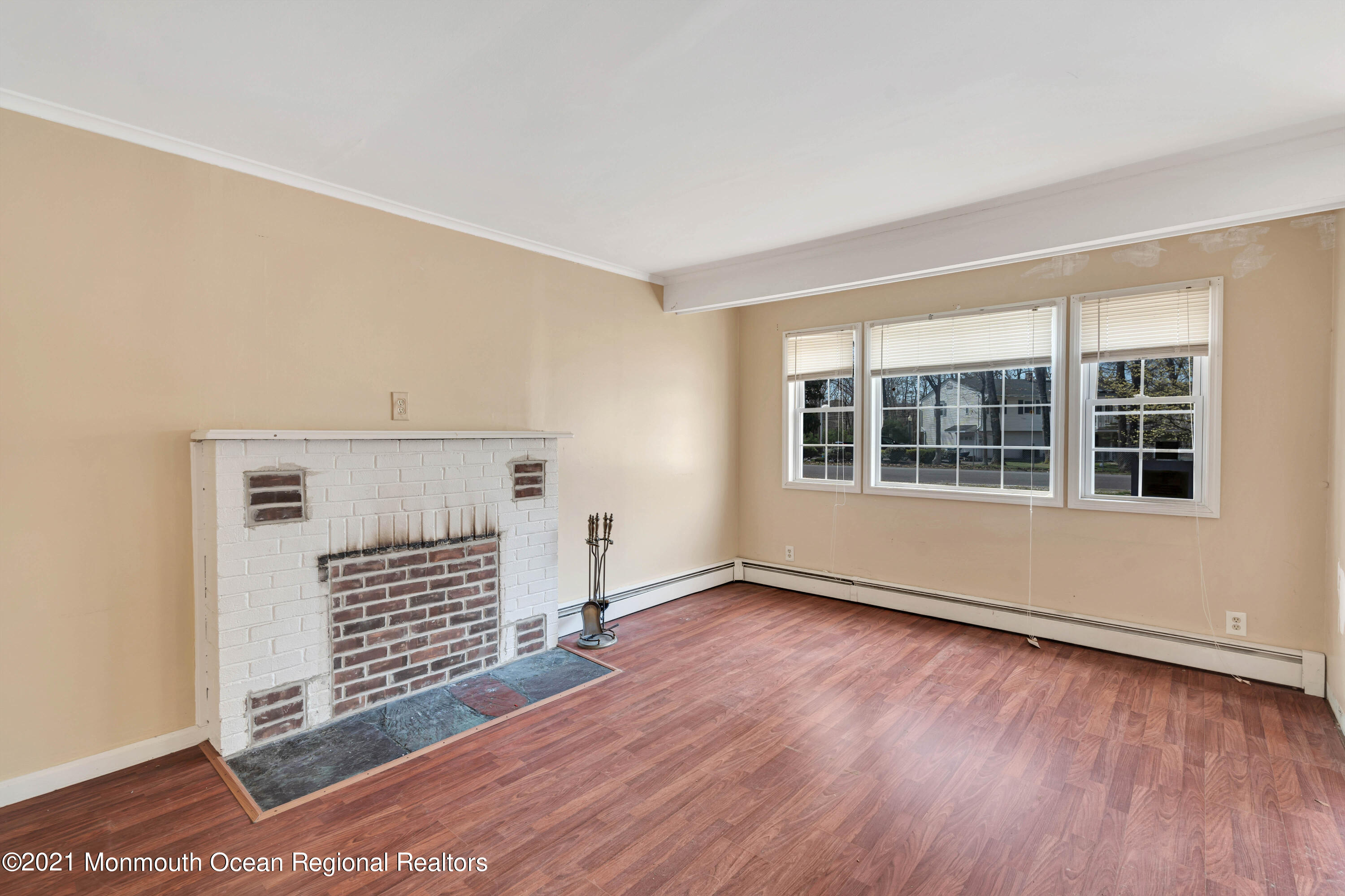 15 North Boston Road Jackson, NJ 08527 - Photo 14 of 49 a view of empty room with wooden floor and fan