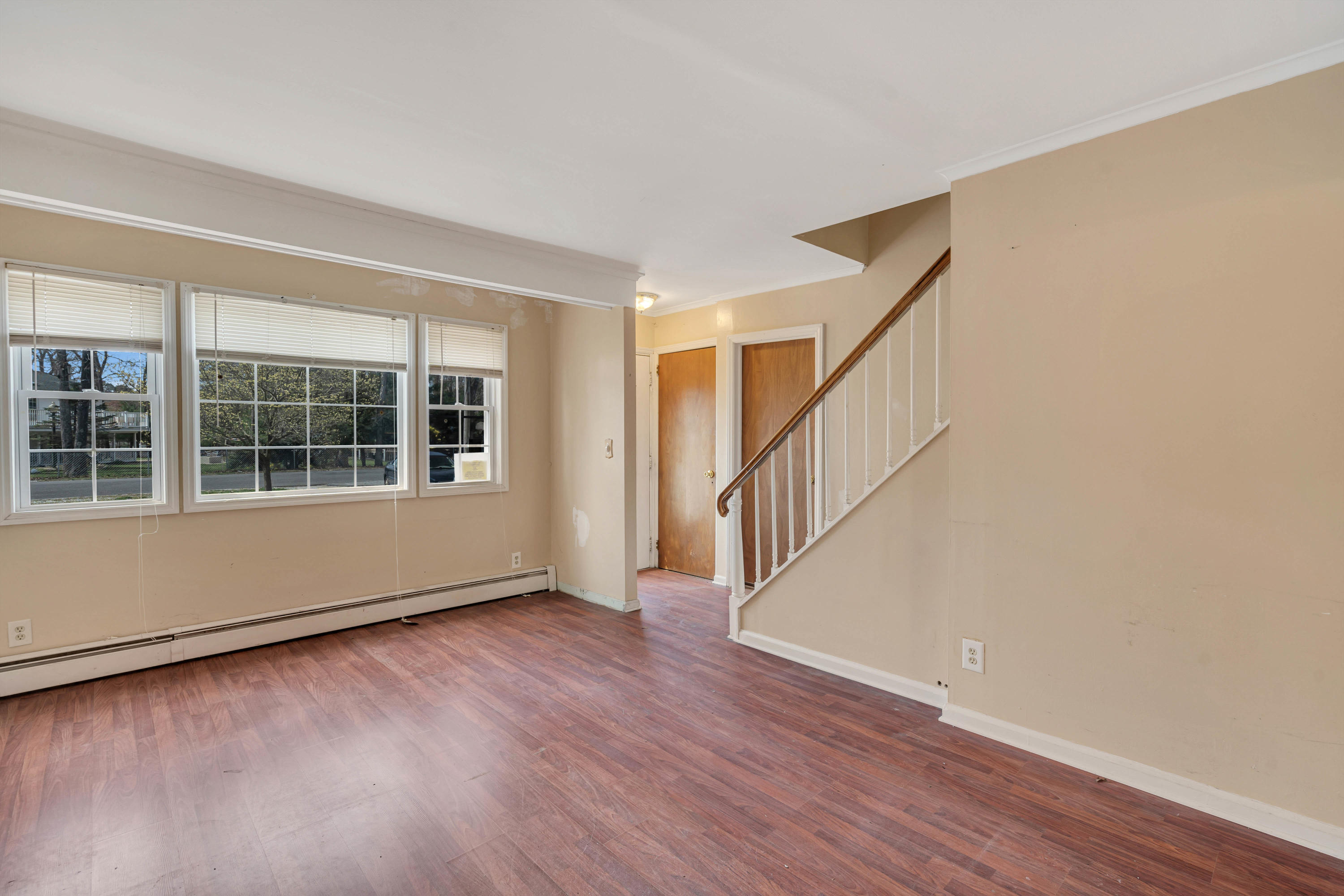 15 North Boston Road Jackson, NJ 08527 - Photo 15 of 49 a view of an empty room with wooden floor and a window