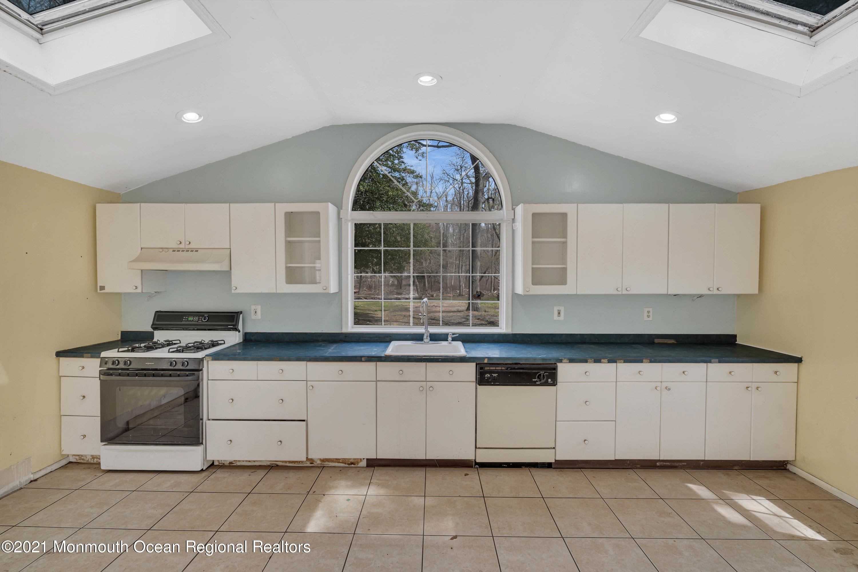 15 North Boston Road Jackson, NJ 08527 - Photo 22 of 49 a kitchen with stainless steel appliances granite countertop a stove a sink and a microwave