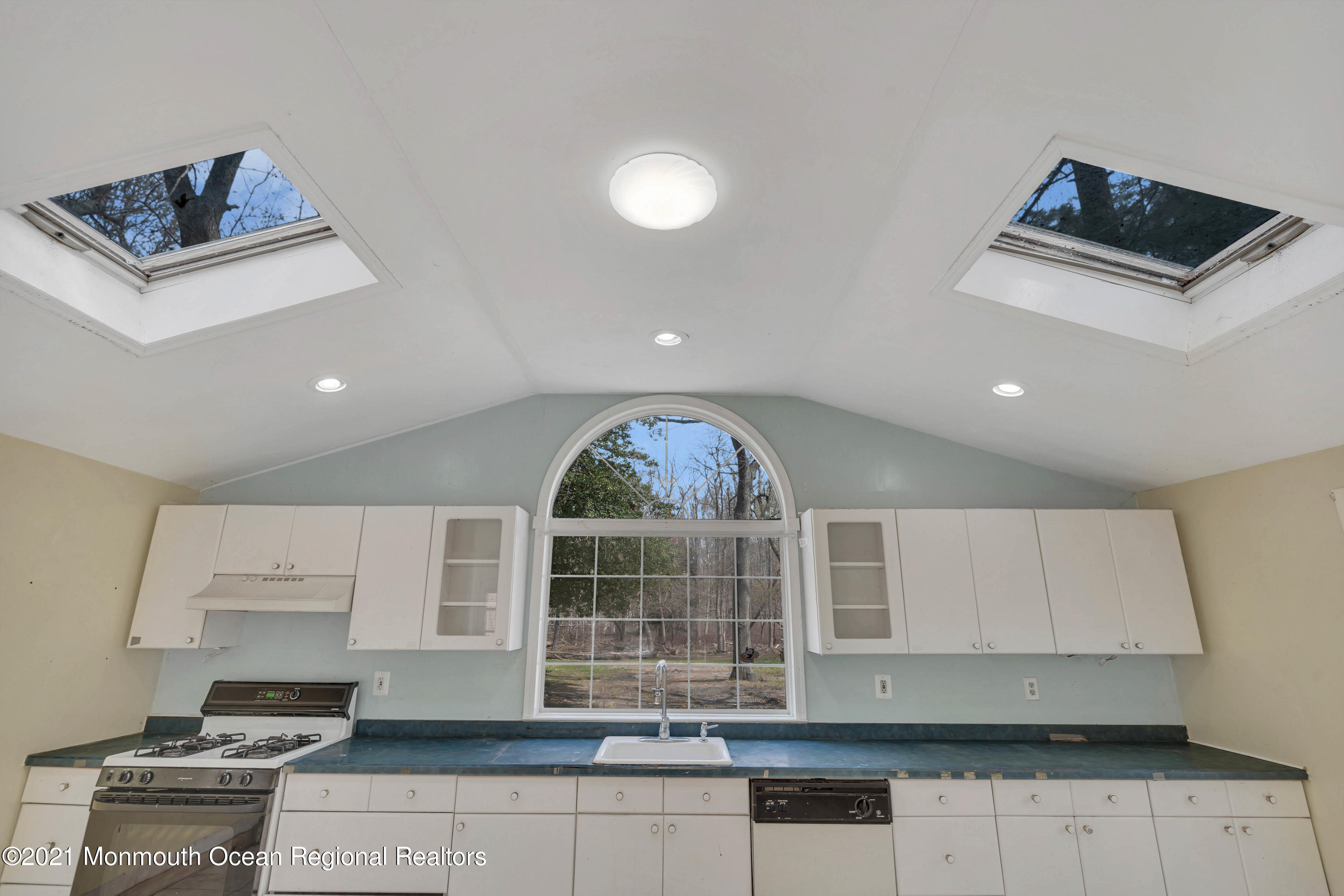15 North Boston Road Jackson, NJ 08527 - Photo 23 of 49 a kitchen with stainless steel appliances granite countertop a stove a sink and a microwave