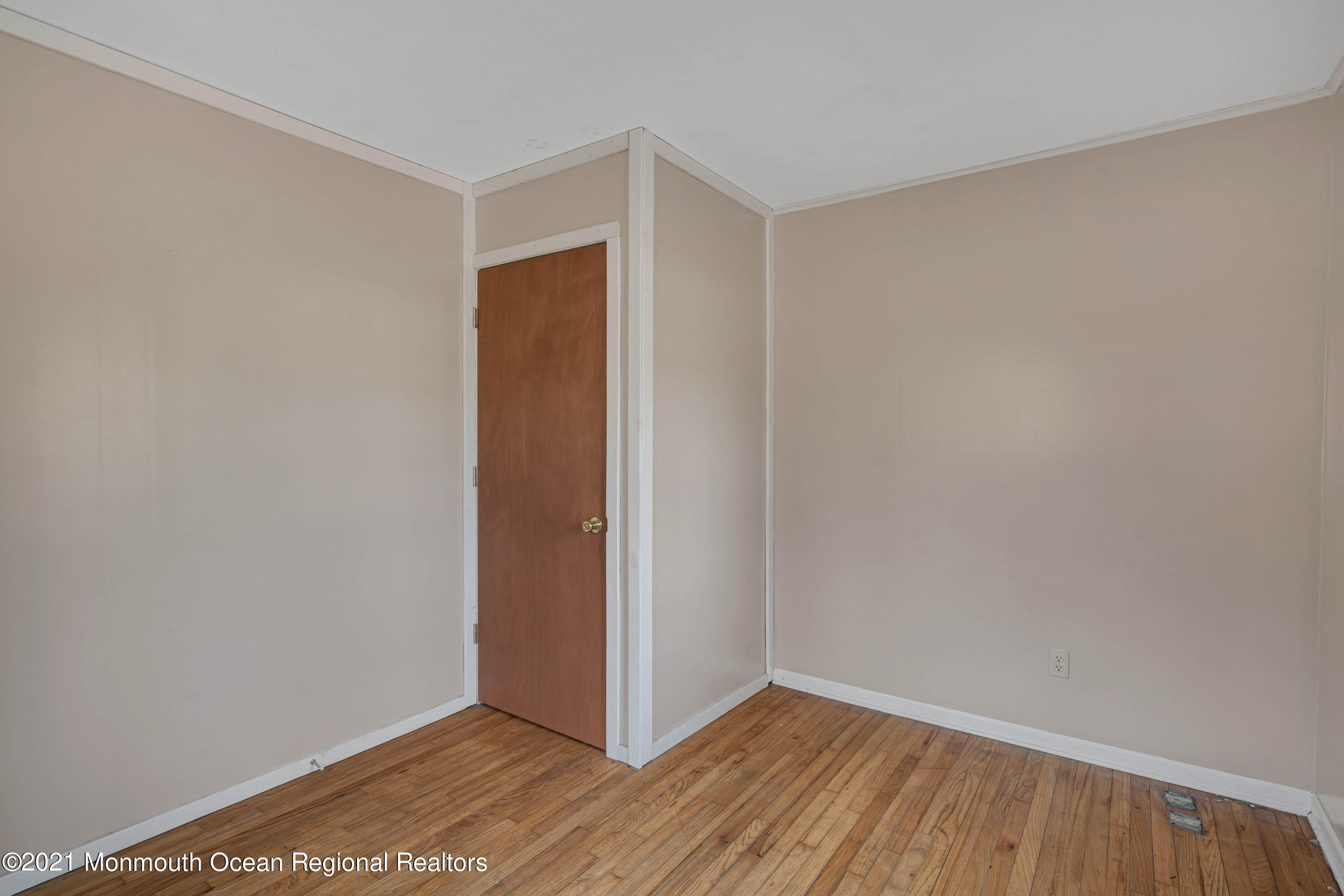 15 North Boston Road Jackson, NJ 08527 - Photo 28 of 49 a view of an empty room with wooden floor