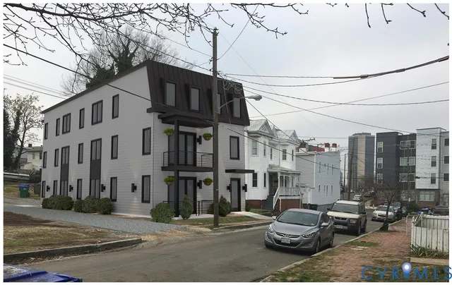a city street lined with tall buildings