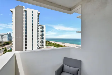 a view of balcony with glass door
