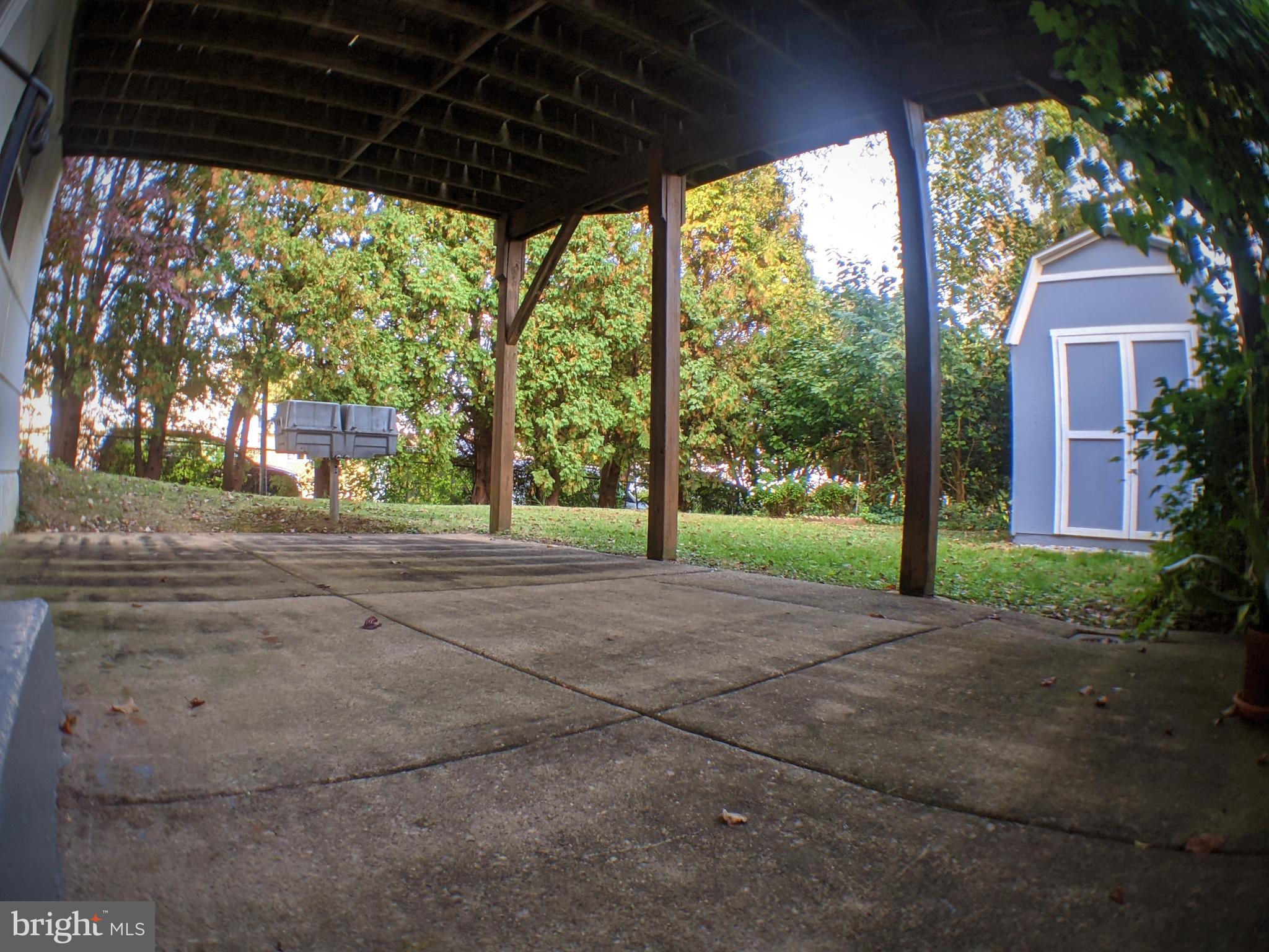 11815 Lockart Road Philadelphia, PA 19116 - Photo 22 of 25 Patio surrounded by green and blue
