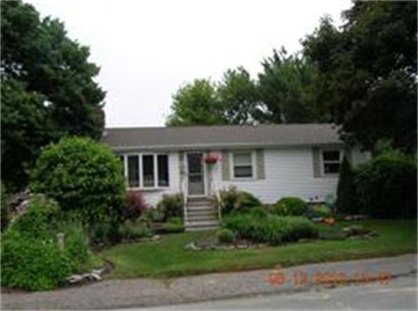 13 Zenas Road Holbrook, MA 02343 - Photo 1 of 1 a front view of house with yard and green space
