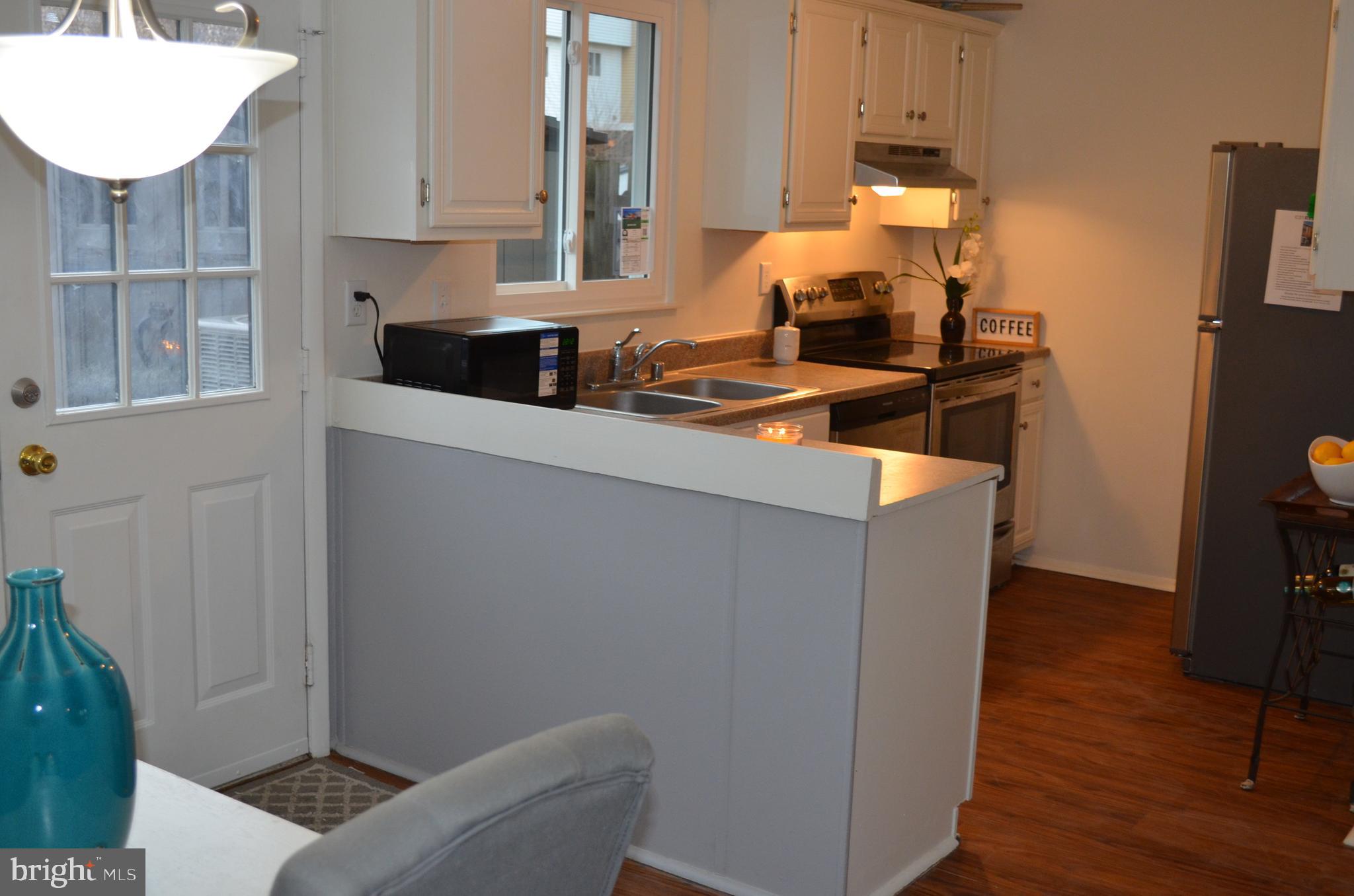 1739 Northridge Lane Frederick, MD 21702 - Photo 6 of 45 a living room with furniture and a window