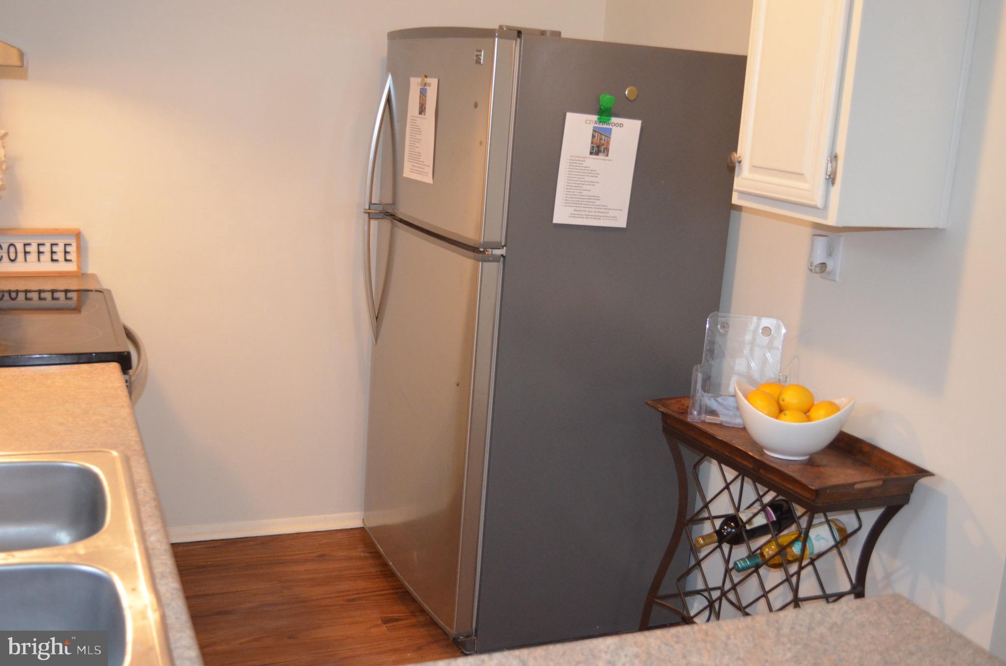 1739 Northridge Lane Frederick, MD 21702 - Photo 9 of 45 a view of kitchen with furniture and wooden floor