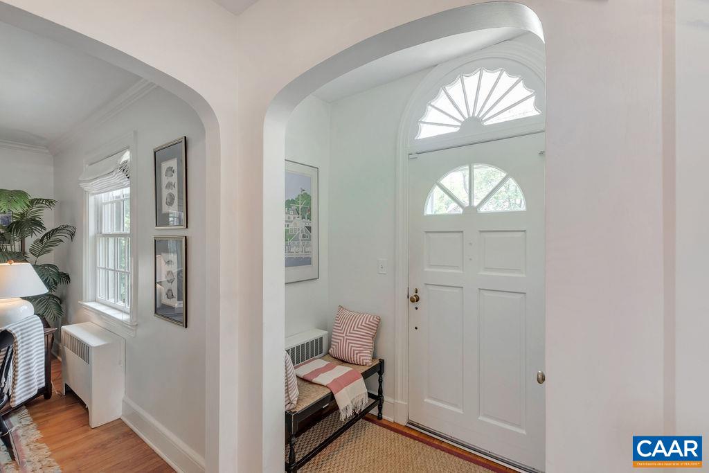 1500 Rugby Avenue Charlottesville, VA 22903 - Photo 12 of 50 a view of a livingroom with wooden floor and a window