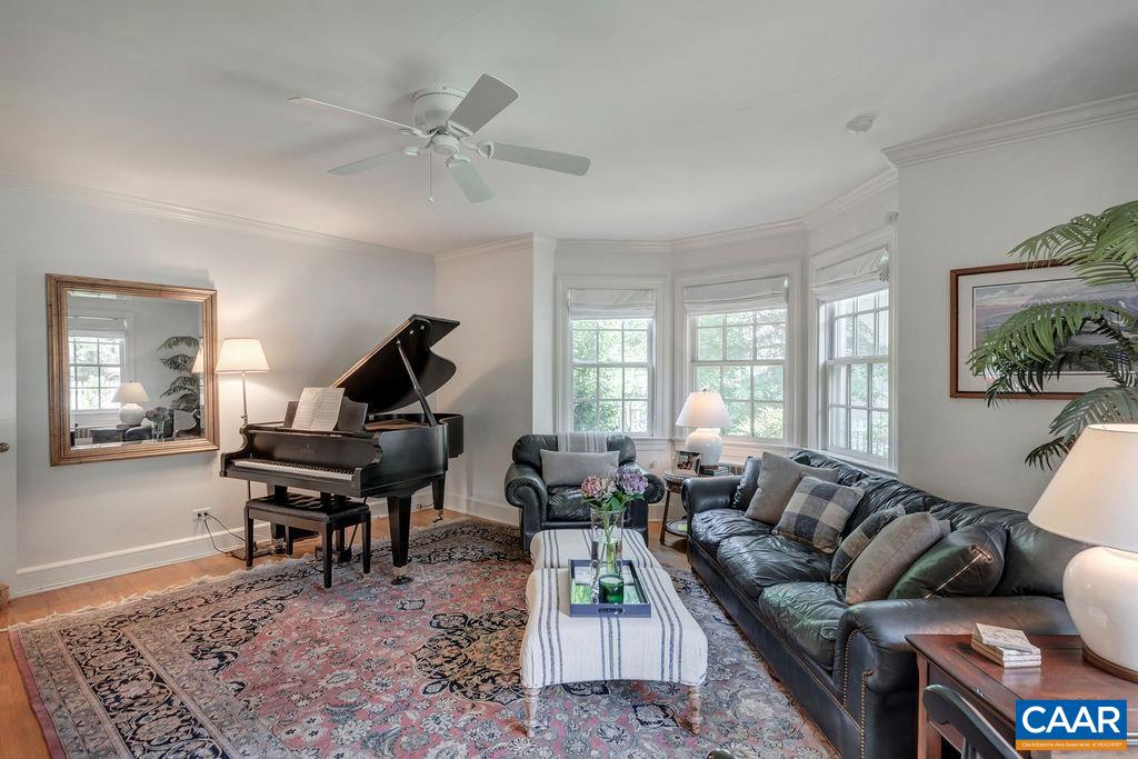 1500 Rugby Avenue Charlottesville, VA 22903 - Photo 13 of 50 a living room with furniture rug and a window