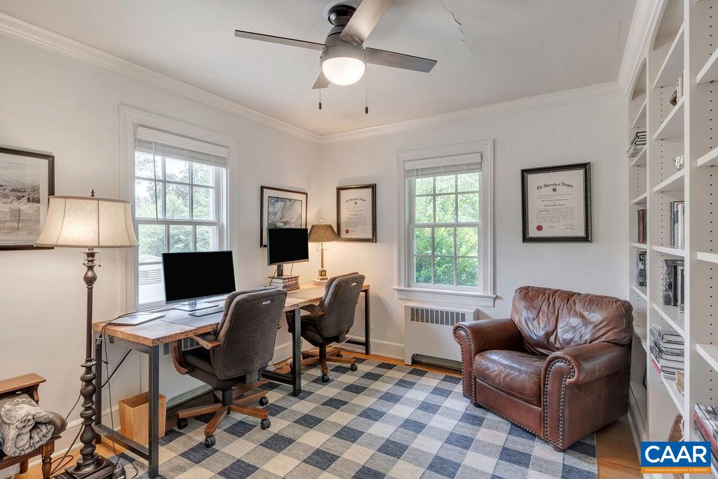 1500 Rugby Avenue Charlottesville, VA 22903 - Photo 23 of 50 a view of a workspace with furniture and a window