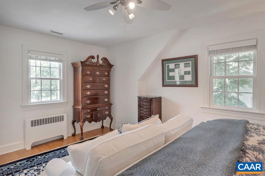 1500 Rugby Avenue Charlottesville, VA 22903 - Photo 26 of 50 a bedroom with a bed and a window