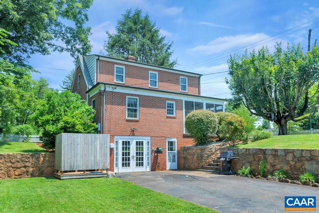 1500 Rugby Avenue Charlottesville, VA 22903 - Photo 38 of 50 front view of a house with a yard