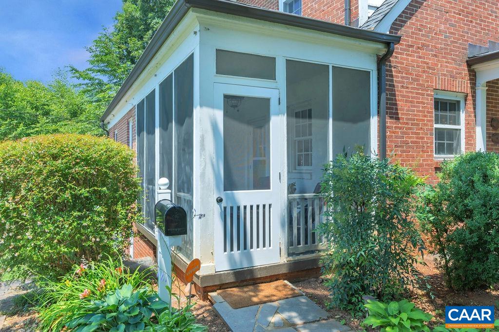 1500 Rugby Avenue Charlottesville, VA 22903 - Photo 44 of 50 front view of a house with a yard
