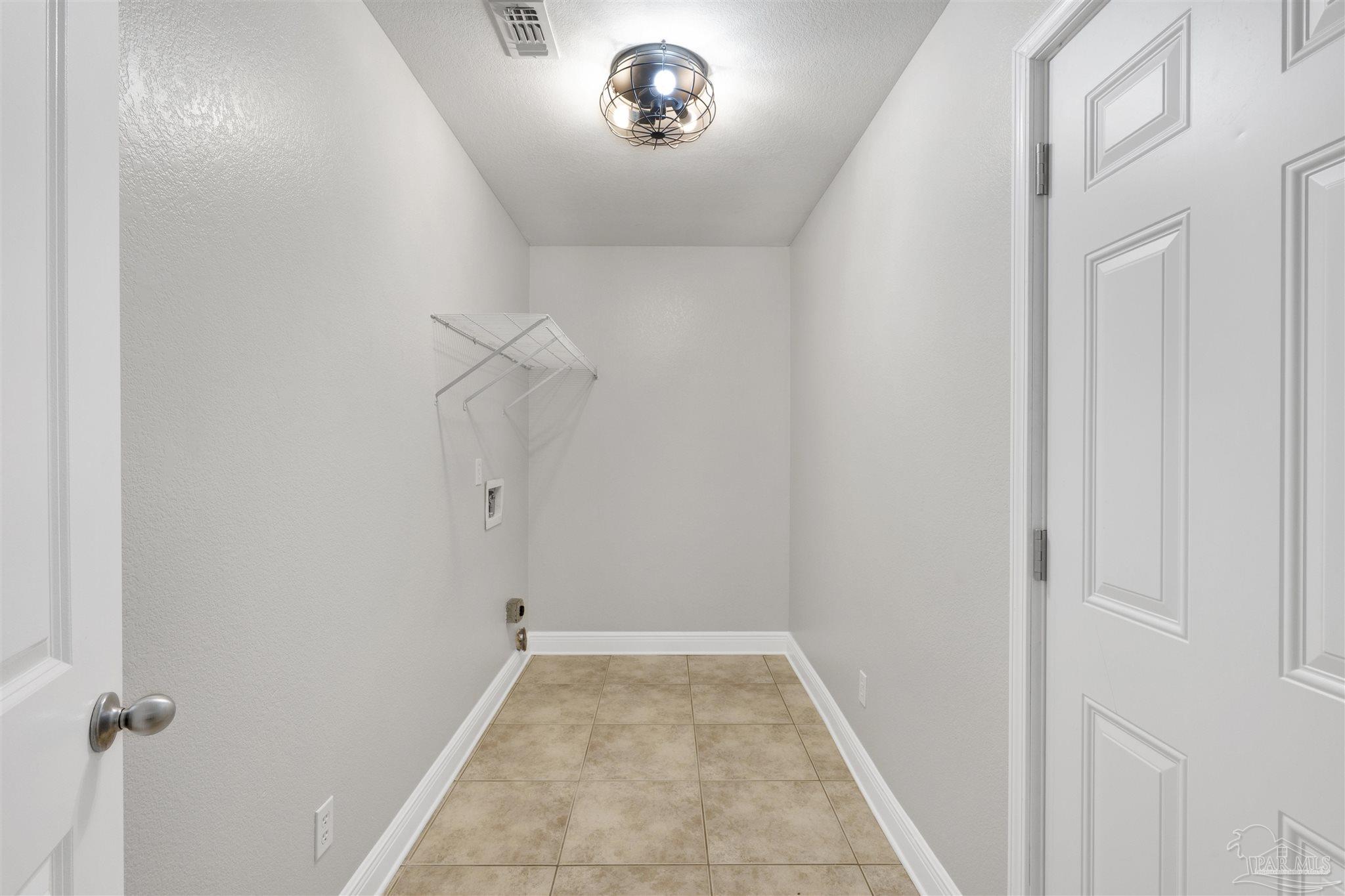 3351 North Simmons Road Jay, FL 32565 - Photo 24 of 36 a view of a hallway with a white walls