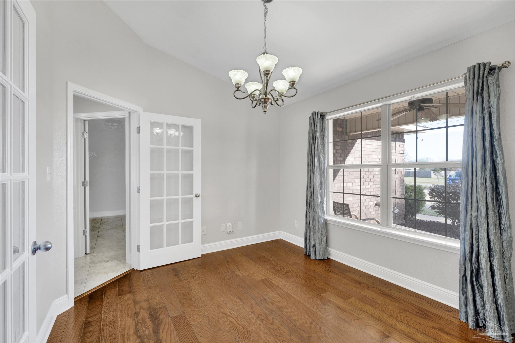 3351 North Simmons Road Jay, FL 32565 - Photo 6 of 36 a view of an empty room with a window