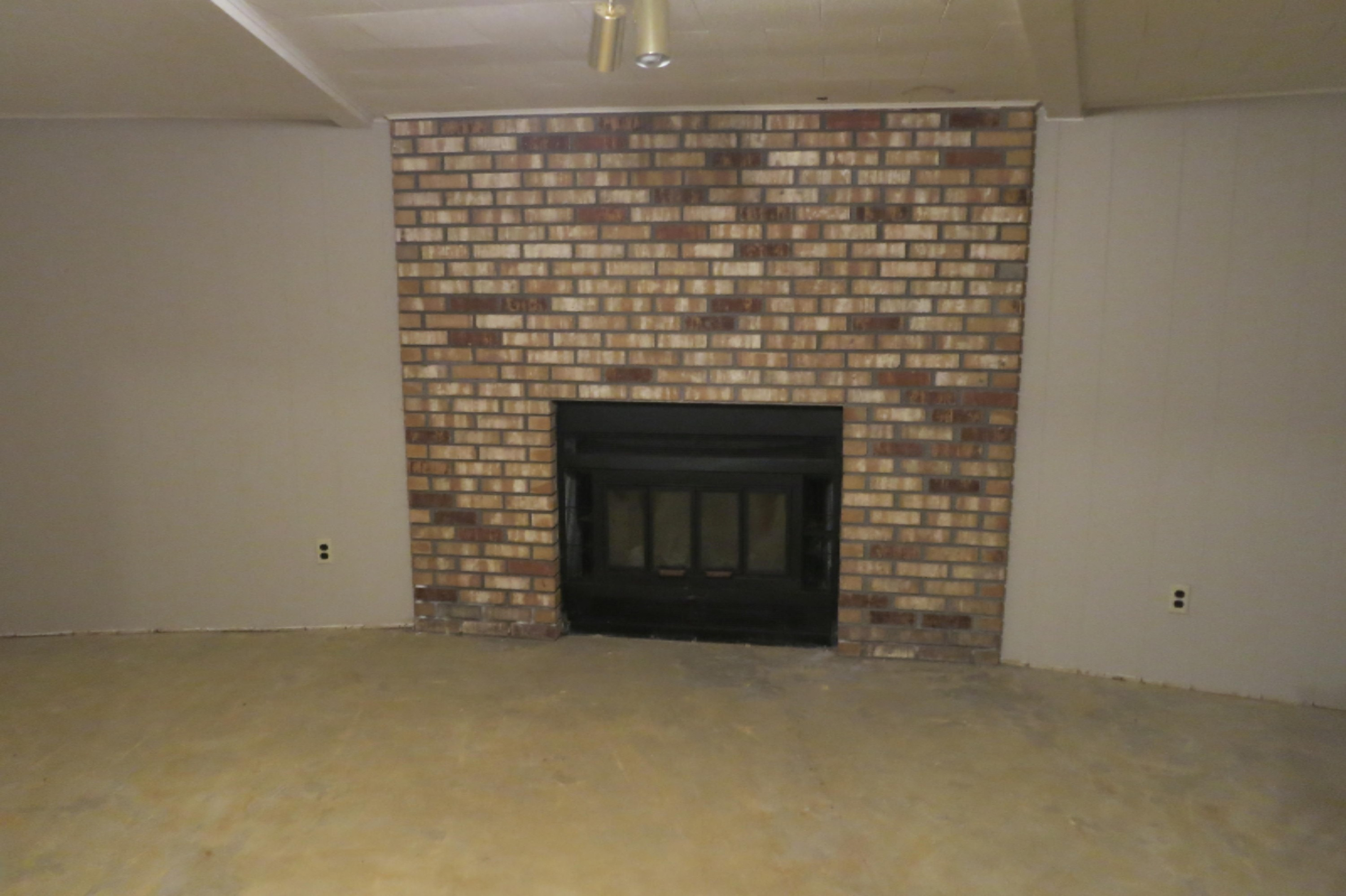 7333 River Ridge Road, Unit 189 Canadian Lakes, MI 49346 - Photo 6 of 22 9 Lower Fireplace