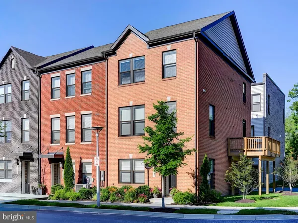 a front view of a multi story residential apartment building