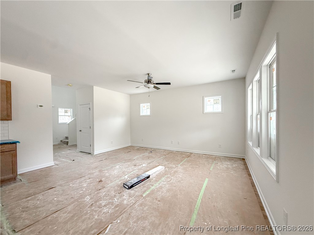 1128 Alex Baker (lot 3) Road Raeford, NC 28376 - Photo 11 of 25 wooden floor in an empty room with a window