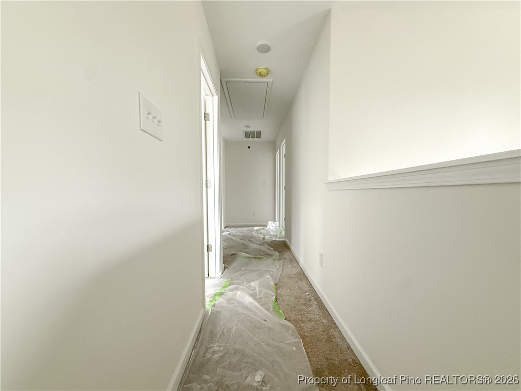 1128 Alex Baker (lot 3) Road Raeford, NC 28376 - Photo 16 of 25 a view of a hallway with a white walls