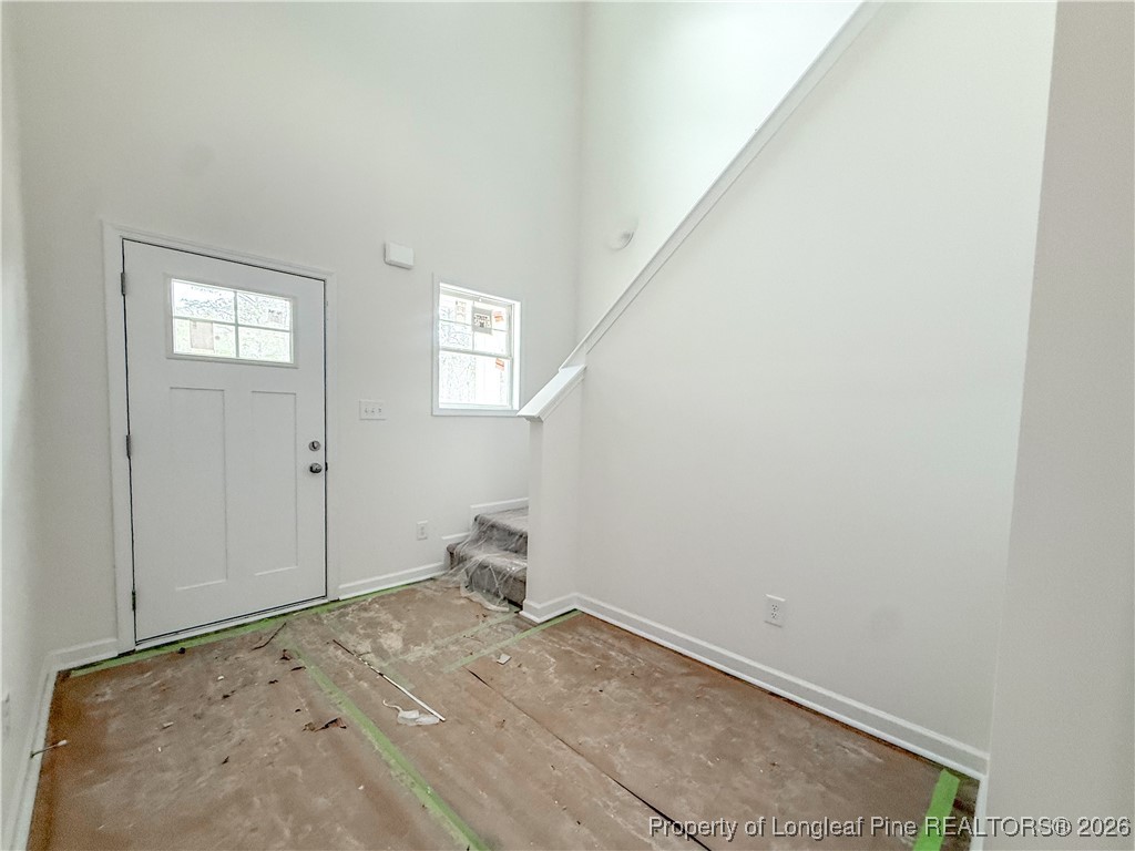 1128 Alex Baker (lot 3) Road Raeford, NC 28376 - Photo 2 of 25 an empty room with a workbench