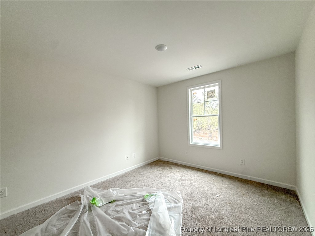 1128 Alex Baker (lot 3) Road Raeford, NC 28376 - Photo 22 of 25 a view of a livingroom with a window
