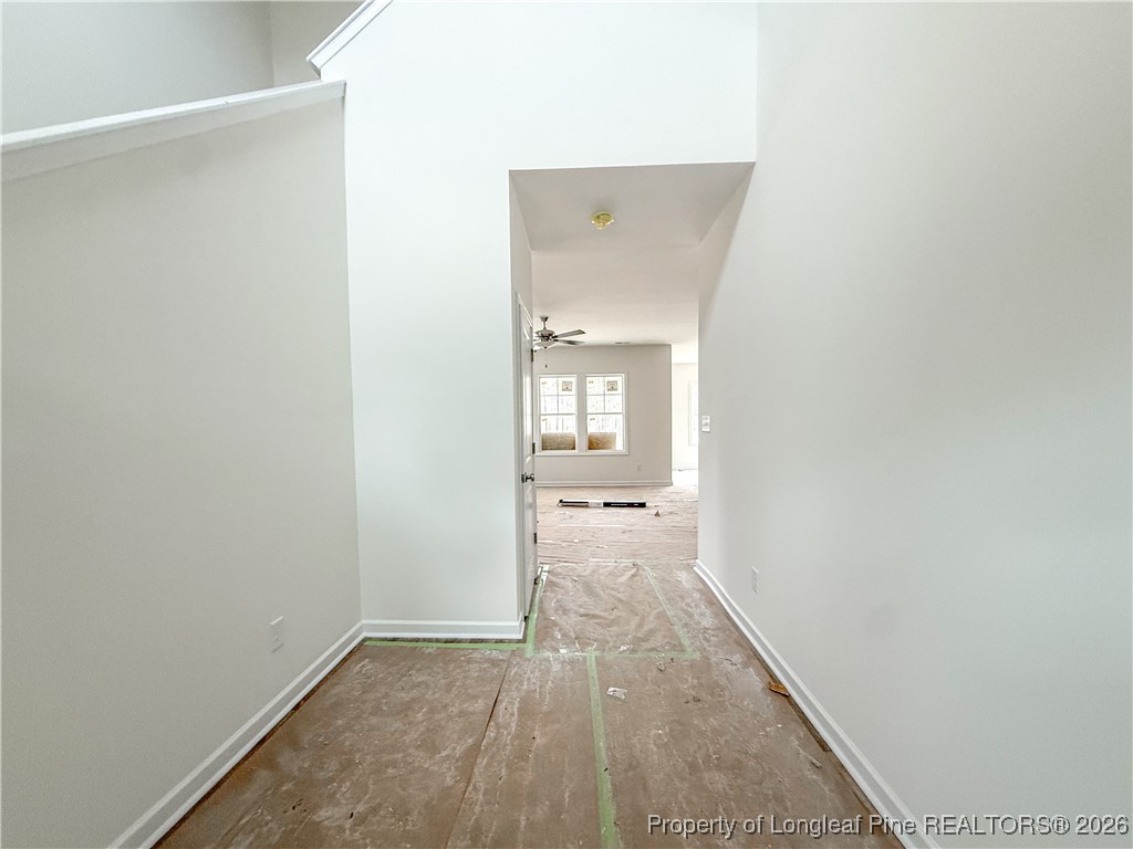 1128 Alex Baker (lot 3) Road Raeford, NC 28376 - Photo 4 of 25 a view of a room with wooden floor and a bathroom
