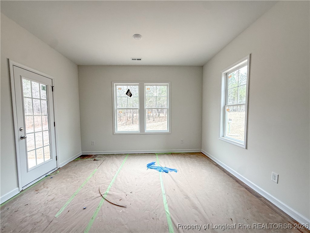 1128 Alex Baker (lot 3) Road Raeford, NC 28376 - Photo 10 of 25 an empty room with windows