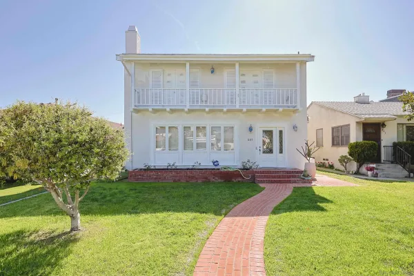 front view of a house with a yard