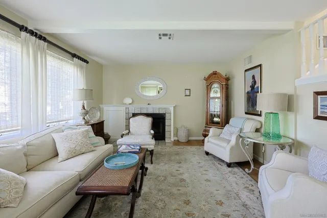 a living room with furniture or couch and a window