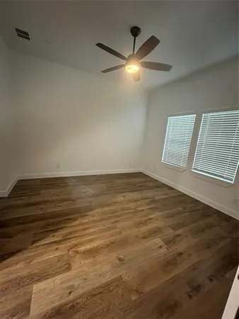 a bathroom with a sink and vanity