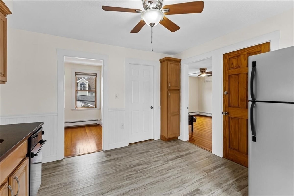 15 Hillock Street, Unit 2 Boston, MA 02131 - Photo 14 of 33 a view of empty room with wooden floor and window