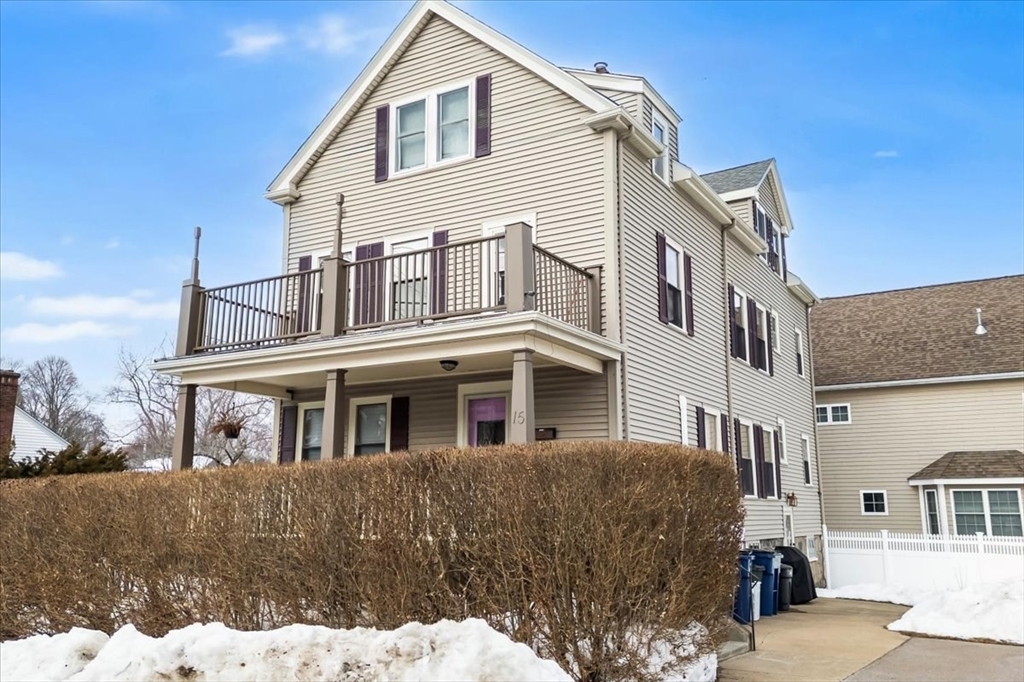 15 Hillock Street, Unit 2 Boston, MA 02131 - Photo 2 of 33 a front view of a house with a yard