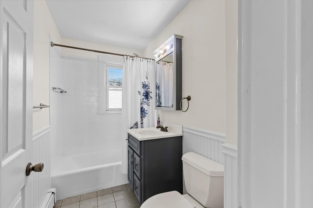 15 Hillock Street, Unit 2 Boston, MA 02131 - Photo 23 of 33 a bathroom with a sink toilet tub and shower