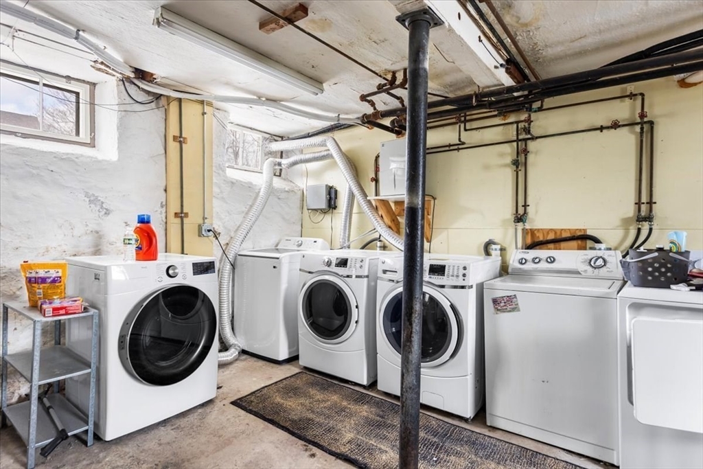 15 Hillock Street, Unit 2 Boston, MA 02131 - Photo 24 of 33 a utility room with dryer and washer