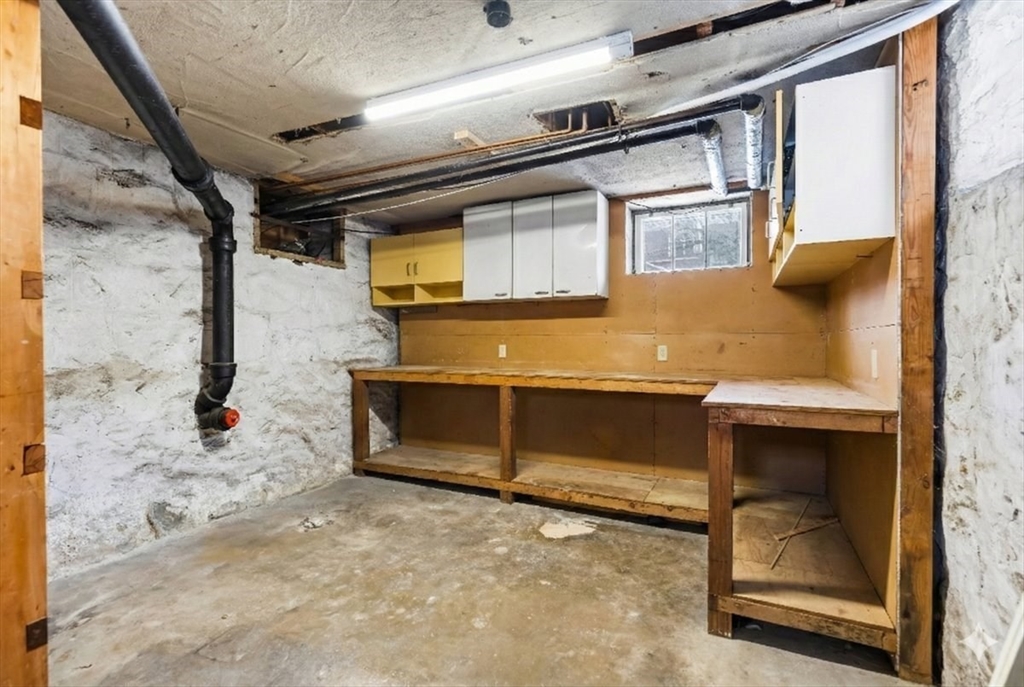 15 Hillock Street, Unit 2 Boston, MA 02131 - Photo 25 of 33 a room with fireplace