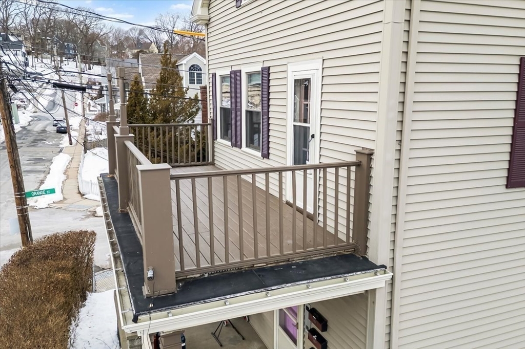 15 Hillock Street, Unit 2 Boston, MA 02131 - Photo 27 of 33 a view of a balcony with furniture