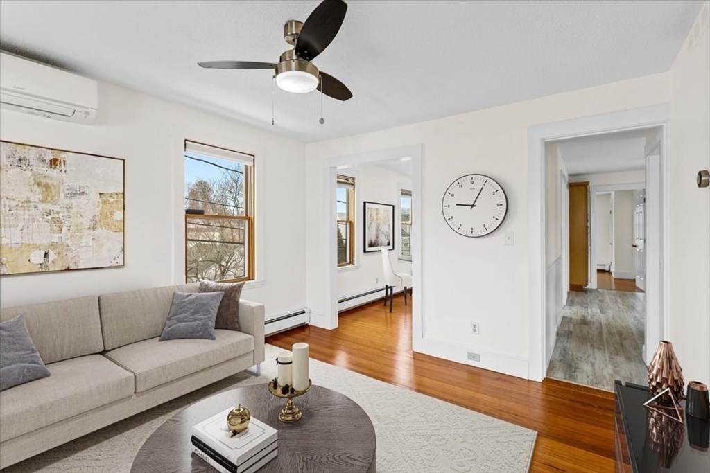 15 Hillock Street, Unit 2 Boston, MA 02131 - Photo 3 of 33 a living room with furniture and a wooden floor