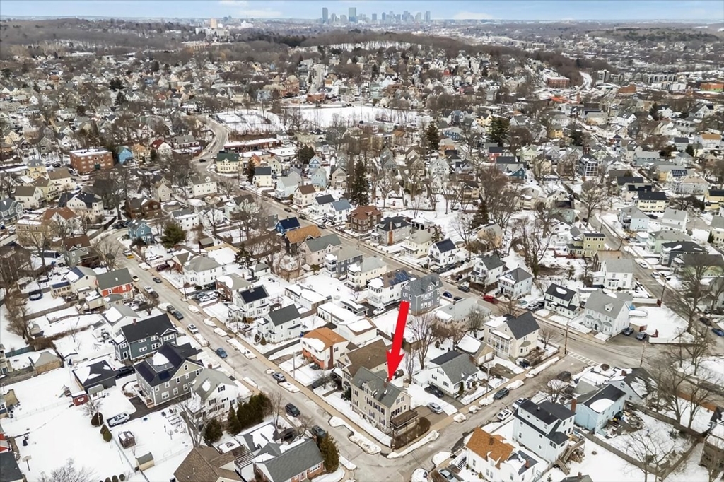 15 Hillock Street, Unit 2 Boston, MA 02131 - Photo 32 of 33 an aerial view of residential houses with city view