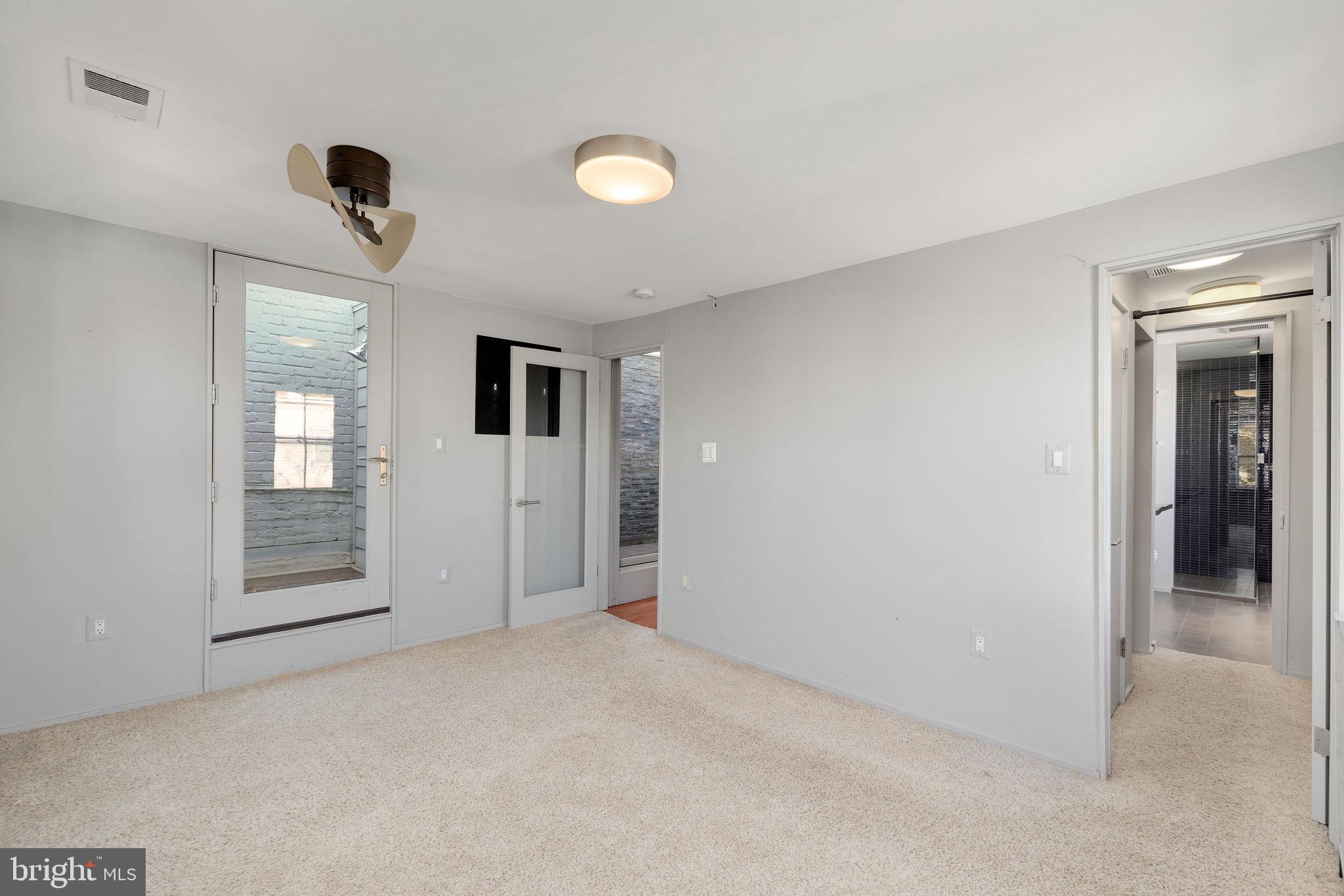 721 D Street Northeast Washington, DC 20002 - Photo 18 of 35 a view of a livingroom with a dishwasher and a window