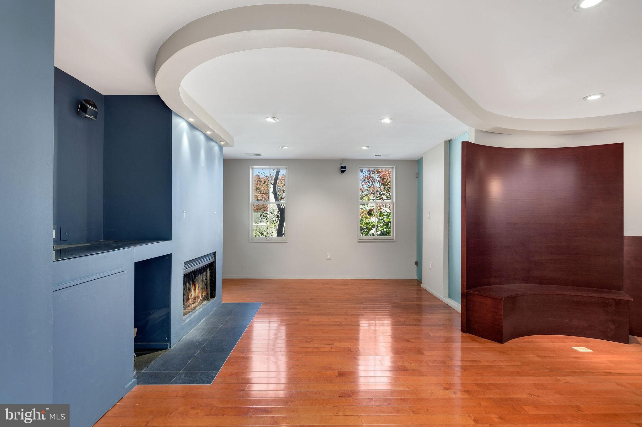 721 D Street Northeast Washington, DC 20002 - Photo 4 of 35 a view of livingroom with hardwood floor and hallway