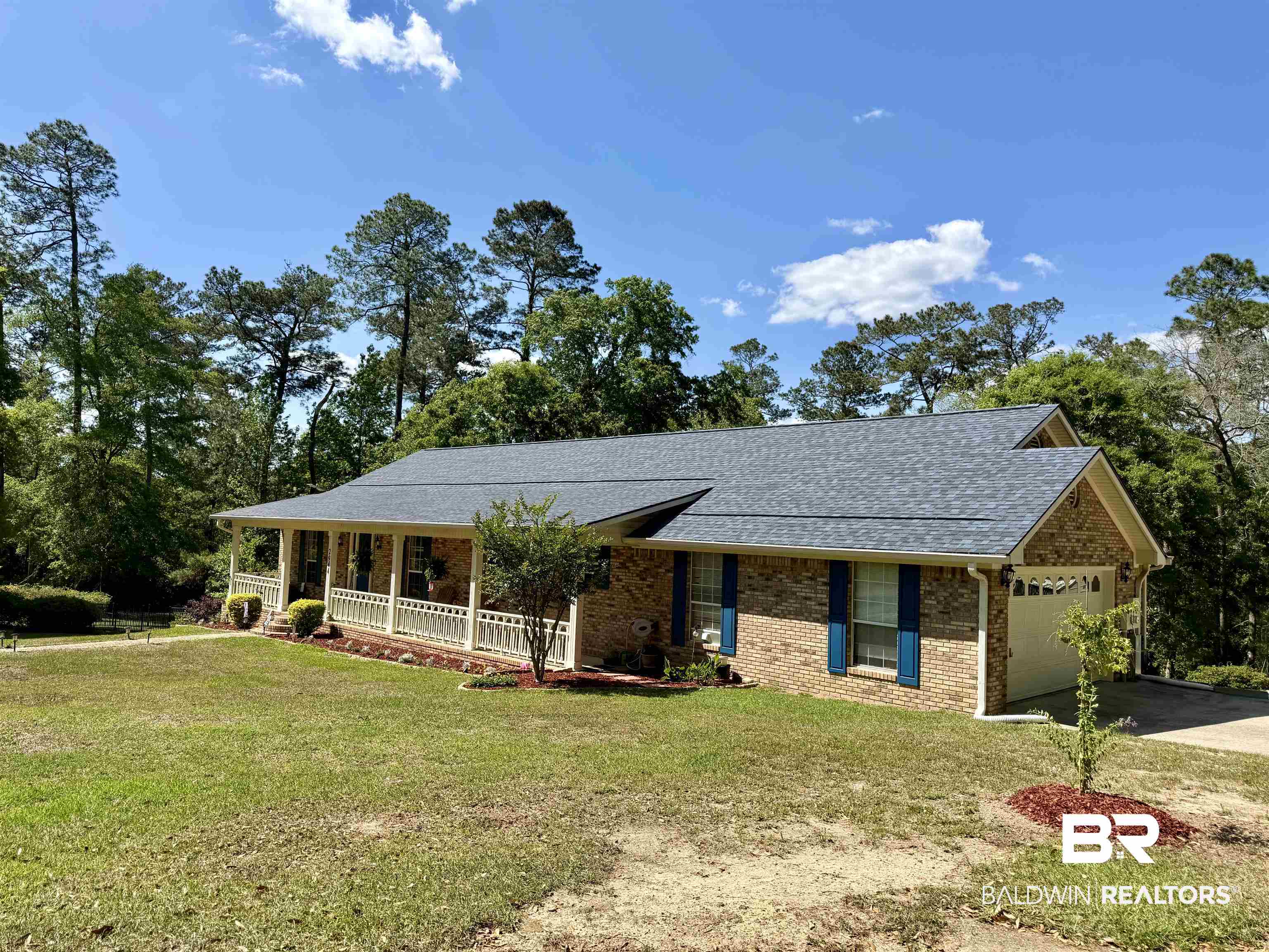 2944 Appleton Road Brewton, AL 36426 - Photo 62 of 65 Single story home with covered porch, a shingled roof, a front lawn, and brick siding