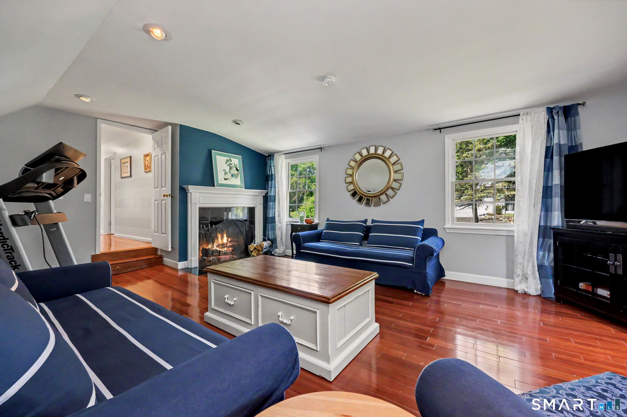 1100 Stillwater Road Stamford, CT 06902 - Photo 18 of 40 Large, comfortable Family Room with wonderful Fireplace on Second Floor