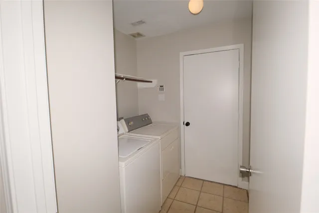 a room that has a sink and a mirror