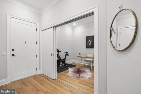 a view of a living room and bathroom